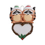 Christmas ornament with two raccoons on a heart-shaped base