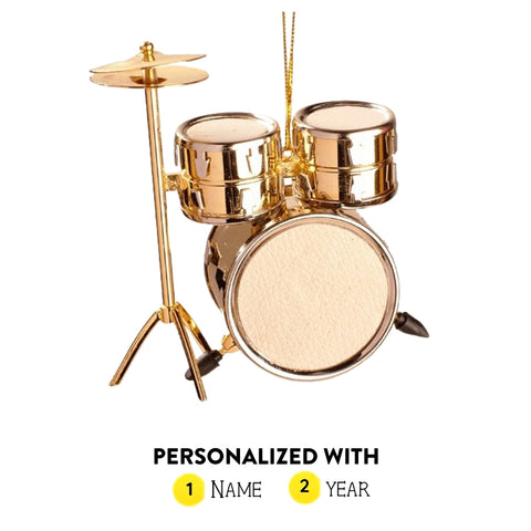 Personalized gold drum set ornament shown with name and year option graphic