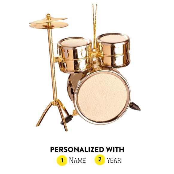 Personalized gold drum set ornament shown with name and year option graphic