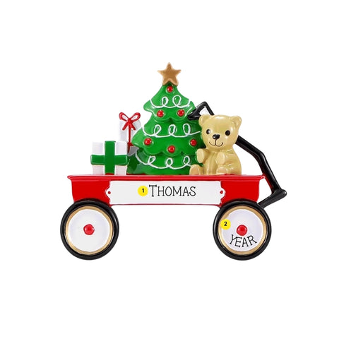Personalized red Christmas wagon ornament with a name on the side of the wagon and space for a year on the wheel.