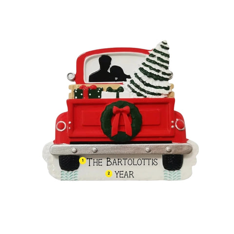 Red holiday truck couple ornament personalizing example with family name and year on snow base