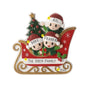 Personalized red sleigh family ornament for three with names on the Santa hats, a family name on the sleigh, and space for a year.