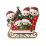 Red sleigh family ornament for five with Santa hats, green scarves, a Christmas tree, holly, and gold runners.