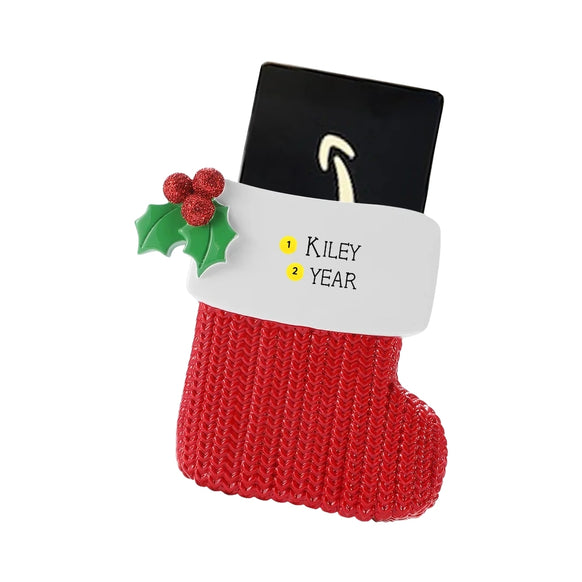 Personalized red stocking money holder ornament with a name and year on the white cuff.
