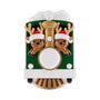 Two Christmas reindeer wearing Santa hats ride in the front of a green holiday train with a gold smokestack and white front banner.