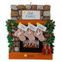 Decorative Christmas ornament of a fireplace with stockings and personalized names.
