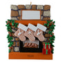 Decorative Christmas ornament of a fireplace with stockings and wreaths.
