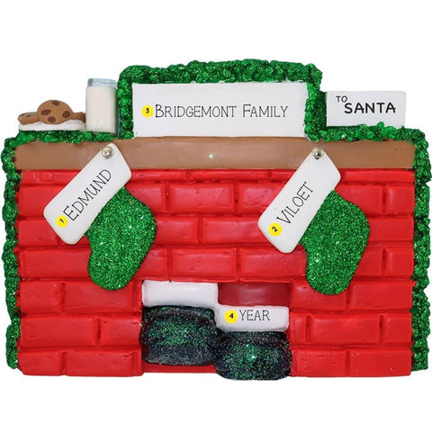 Christmas ornament of a mantel with personalized stockings against a white background