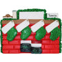 Christmas ornament of a mantel with stockings against a white background