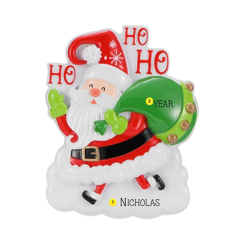 Personalized Santa ornament with a name written on the snowy base and a year added to the green gift sack.