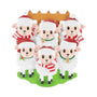 Sheep family of 6 ornament with six sheep in Santa hats by a wooden fence.