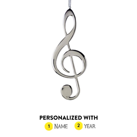 Personalized silver treble clef ornament shown with name and year option graphic