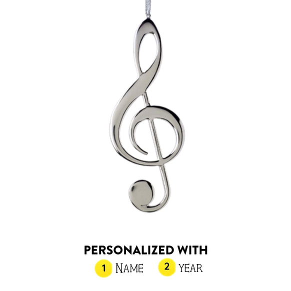 Personalized silver treble clef ornament shown with name and year option graphic