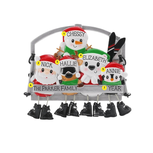 Personalized ski lift family of 5 ornament with example names on the hats, a family name or phrase on the chairlift bar, and year.