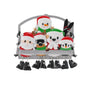Ski lift ornament with Santa, reindeer, polar bear, penguin, and snowman riding together with skis, winter hats, and dangling boots.