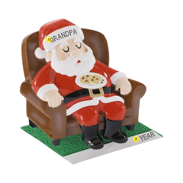 Personalized sleepy Santa on chair ornament with a name on Santa’s hat and the year written on the base.