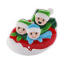 Family of 3 ornament with three smiling figures in winter hats on a red and white snow tube
