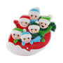 Family of 6 ornament with six smiling figures in winter hats on a red and white snow tube
