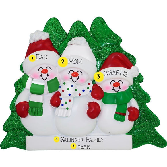 Personalized Christmas ornament with three snowman family members in front of a green tree.