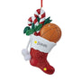 Personalized basketball stocking ornament showing name placement on the white cuff and year placement on the red toe.
