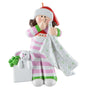 Decorative figurine of a young girl in striped pajamas with a bunny and blanket on a white background