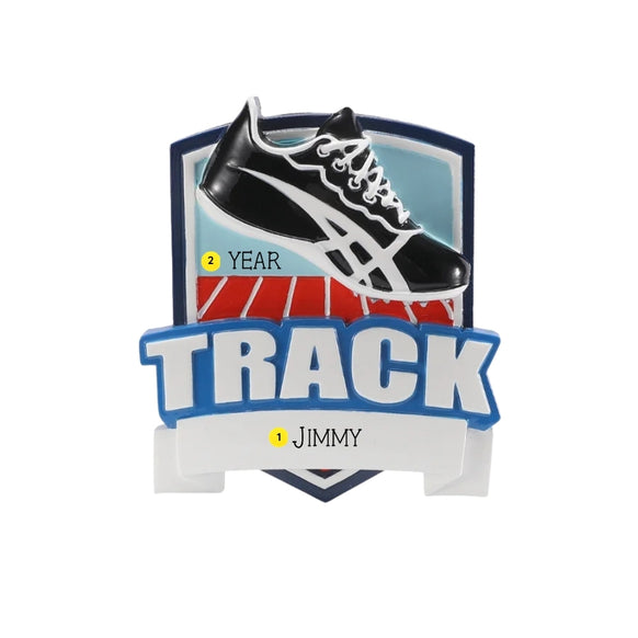 Personalized track shield ornament with a name on the bottom banner and space for a year near the track lanes.