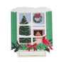 Traditional Christmas window ornament with green shutters, a decorated tree, wreath, fireplace, holly, red bow, and cardinal.