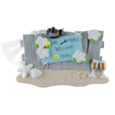 Personalized beach-themed wedding ornament on white background can be personalized
