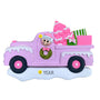  This ornament is a bright pink truck driving through the snow with a decorated Christmas tree and wrapped gifts in the truck bed. 