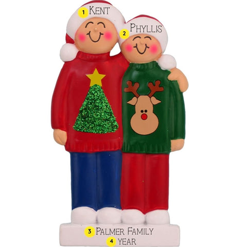 Decorative ornament of a couple wearing Christmas-themed sweaters with personalized names and family information.