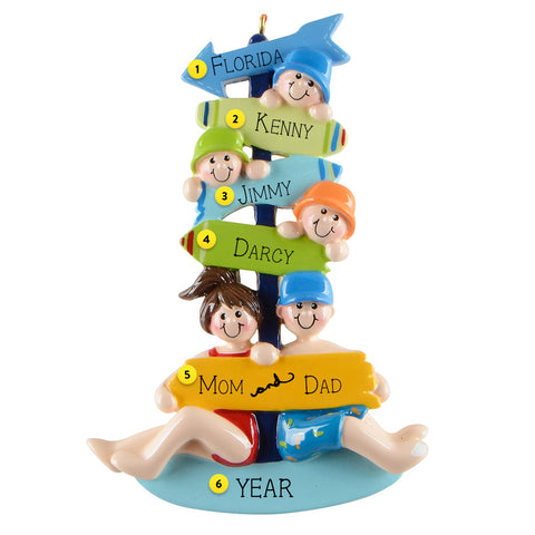 Personalized Christmas ornament with children's names and a family of five on a ladder.