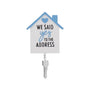 House ornament with a blue roof, dangling silver key, and “We Said Yes to the Address” printed on the front.