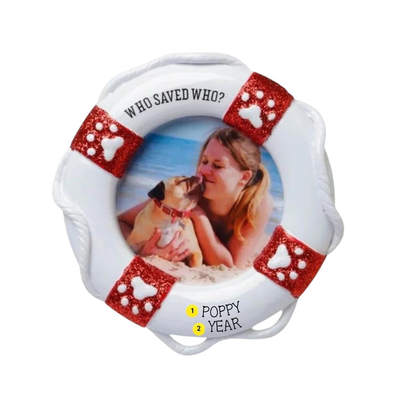Personalized lifesaver picture frame ornament with “Who Saved Who?” at the top, a photo of a woman and her dog in the center, and space at the bottom for a pet name and year.