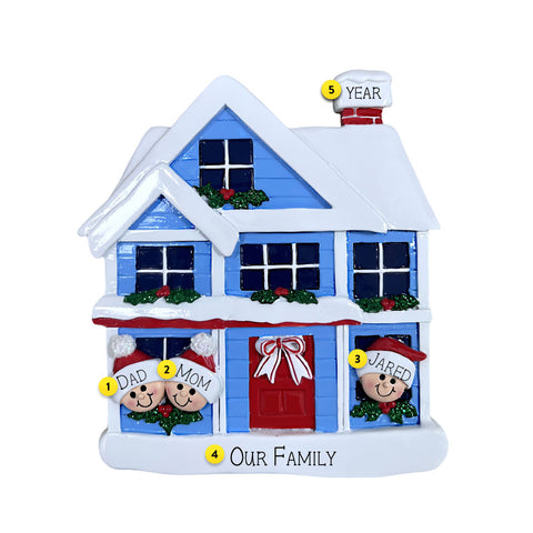 Decorative house ornament with family members and personalized names on a white background