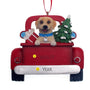 Yellow Lab Dog Christmas ornament in a red truck with a tree and presents on a white background
