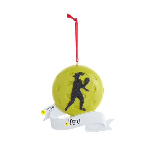 Personalized pickleball ornament with a female player silhouette, yellow pickleball design, and white banner with space for a name and year.