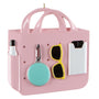Pink beach bag ornament with a white bottle, aqua round accessory, yellow sunglasses, and white clipboard on the front.
