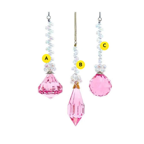 Three pink crystal beaded drop ornaments with faceted diamond, teardrop, and round shapes, each topped with iridescent bead strands.