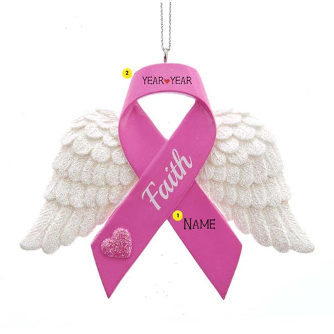 Personalized pink ribbon angel wing ornament with white wings, Faith lettering, glitter heart, and name and year placement guide.