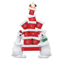 Polar bear gifts tabletop decoration with two polar bears holding a tall stack of red Christmas presents topped with a penguin.