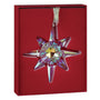 Star-shaped crystal ornament with a red box on a white background