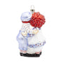 Back view of glass Raggedy Ann & Andy Holiday Hug ornament showing Andy’s blue outfit and the back of Ann’s red yarn hair.