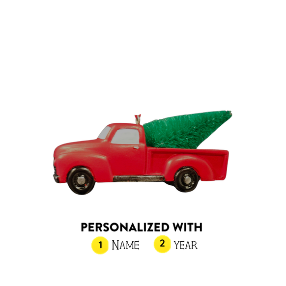 Red pickup truck Christmas ornament with tree showing personalization placement for one name and year.