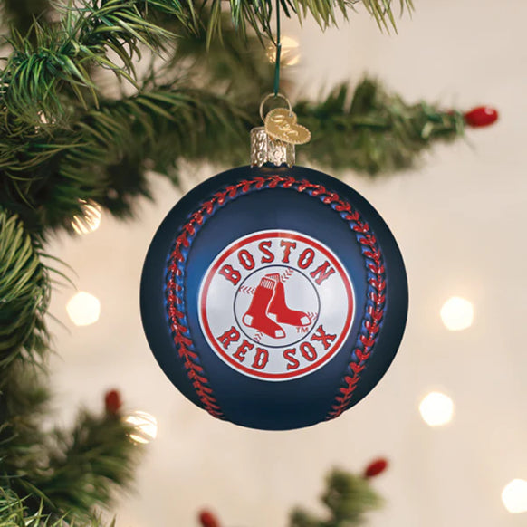 Boston Red Sox ornament hanging on a Christmas tree with lights in the background