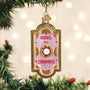 Decorative Christmas ornament with 'Ring for Drinks' text on a festive background.