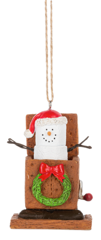 S’mores Jack-In-The-Box ornament featuring a marshmallow snowman-style figure popping out of a graham cracker jack-in-the-box with a Santa hat, holiday wreath, and red crank handle.