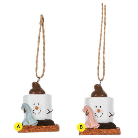 S’mores baby blanket ornaments featuring smiling marshmallow characters with chocolate tops, each holding a pastel baby blanket and standing on graham cracker bases.