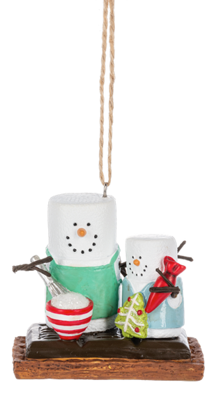 S’mores Baking ornament featuring two marshmallow snowman-style figures on a graham cracker base, with baking accessories including a mixing bowl, whisk, rolling pin, and Christmas tree cookie.