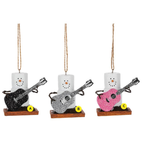 Three S’mores Blingy Guitar ornaments shown together, each featuring a marshmallow snowman-style figure on a graham cracker base holding a glitter guitar in black, silver, or pink.