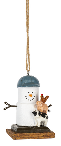 S’mores Farmer ornament featuring a marshmallow snowman-style figure on a graham cracker base with a blue cap, standing beside a stacked farm animal scene with a chicken, pig, and cow.